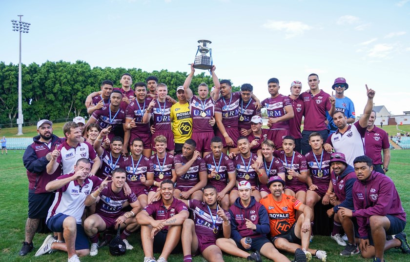 Premiers...Manly players and officials celebrate their superb season