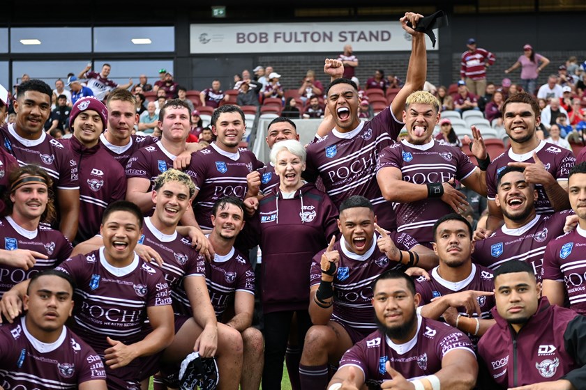 That winning feeling...Manly Jersey Flegg players celebrate with our Sea Eagles Pathways Academy Partner, Kay van Norton Poche, from Poche Centre for Indigenous Health, at 4 Pines Park on Sunday.