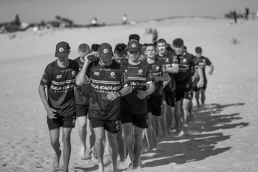 Strong bond...the Sea Eagles SG Ball team hard at it during their beach session at North Curl Curl