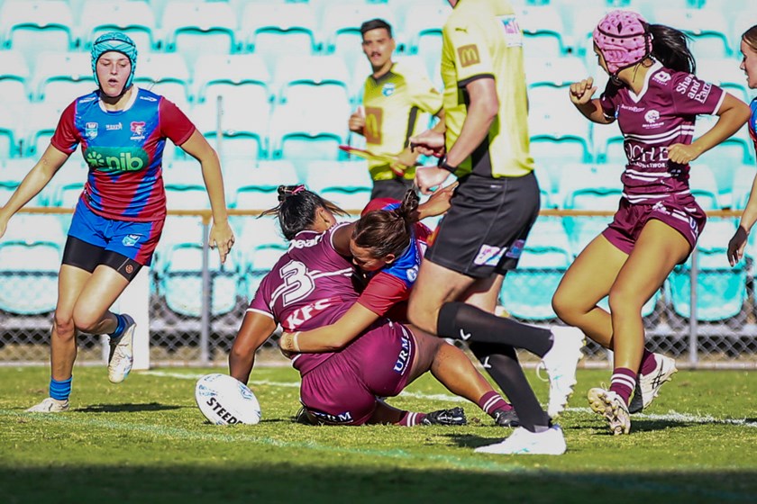Got there....centre Aleksandra Tunufai crosses for her try at Leichhardt Oval