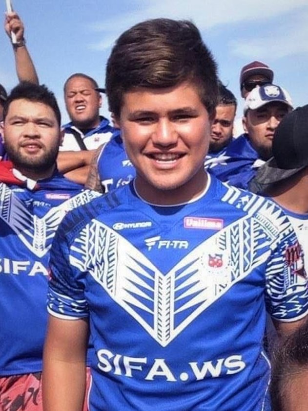 A young Josh Schuster cheers on his beloved Samoa 