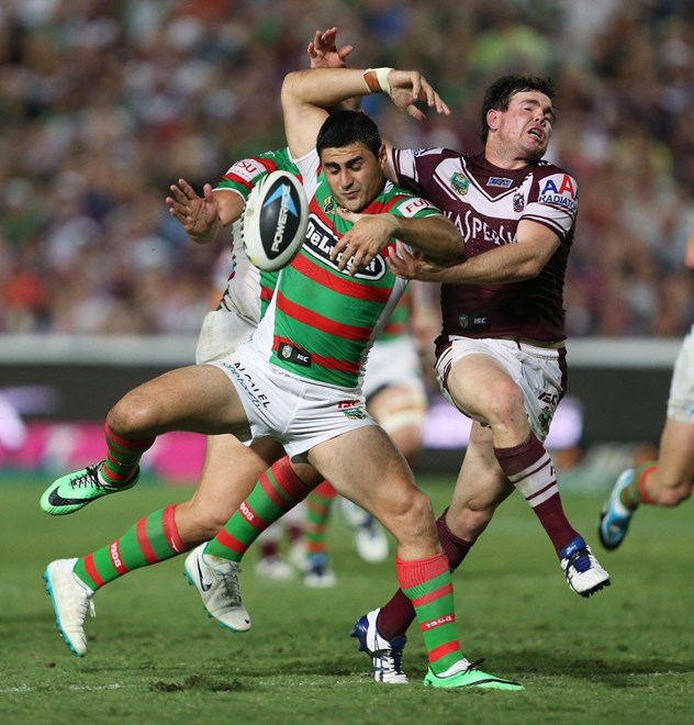 Digital Image by Robb Cox Â© nrlphotos.com : Jamie Lyon and Bryson Goodwin go for a loose ball  : NRL Rugby League - Round 2 - Manly Warringah Sea Eagles V South Sydney Rabbitohs at Central Coast Stadium, Friday the 14th of March 2014.