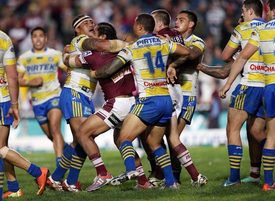 Steve Matai is held back by Fuifui Moimoi as a fight breaks out: NRL Round 17, Manly Warringah Sea Eagles v Parramatta Eels, Brookvale Oval, Monday 8th July 2013. Photo: Copyright Â© Renee McKay/Action Photographics