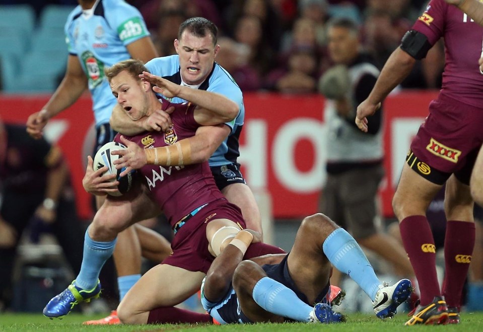 Digital Pic by Robb Cox Â© Action Photographics: Paul Gallen tackles Daly Cherry Evans : State of Origin Rugby League -  2014 - NSW Vs QLD at ANZ Stadium Wednesday the 18th of June 2014.