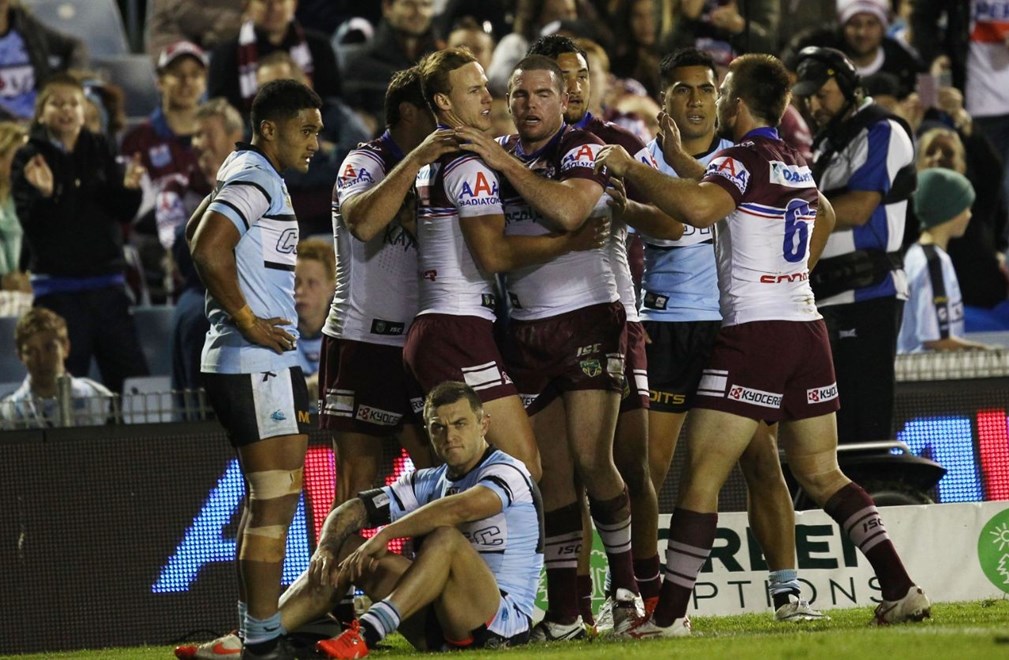 Photo by Colin Whelan copyright © nrlphotos.com :       Manly celebrate the try to Jamie Lyon with Sharks Feki and (bottom) Gardner less happy                        NRL Rugby League, Round 15 Cronulla Sutherland Sharks v Manly Warringah Sea Eagles at Cronulla, Saturday June 21st 2014