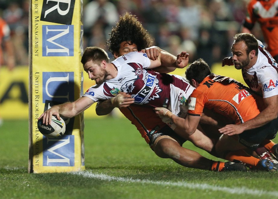 Digital Image by Robb Cox Â©nrlphotos.com: Kieran Foran about to score a try :NRL Rugby League - Manly Warringah Sea Eagles V Wests Tigers at Brookvale Oval, Friday the 11th of July 2014.