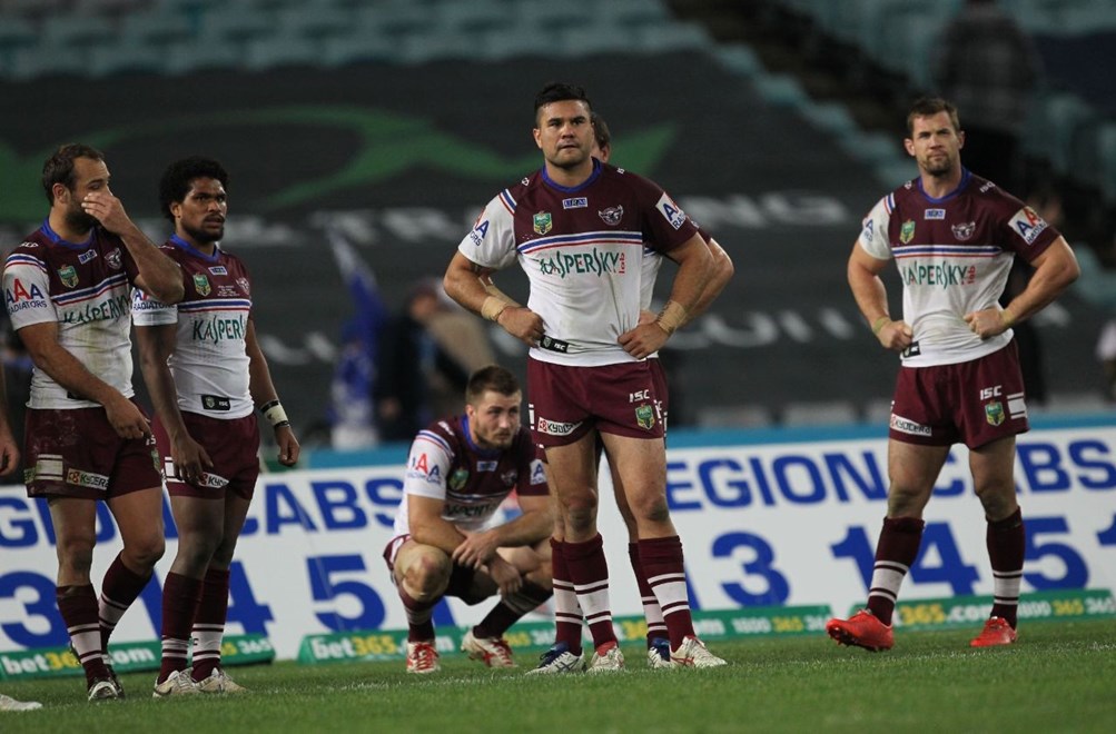Photo by Colin Whelan copyright © nrlphotos.com :      Manly players in shock at fulltime with Justin Horo, centre                         NRL Rugby League, Round 17 Canterbury Bankstown Bulldogs v Manly Warringah Sea Eagles at Sydney Olympic Stadium, Friday July 4th 