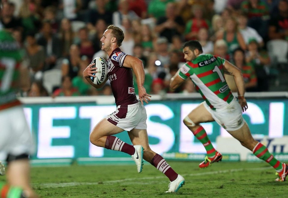 Digital Image by Robb Cox Â© nrlphotos.com : Daly Cherry Evans makes a break : NRL Rugby League - Round 2 - Manly Warringah Sea Eagles V South Sydney Rabbitohs at Central Coast Stadium, Friday the 14th of March 2014.