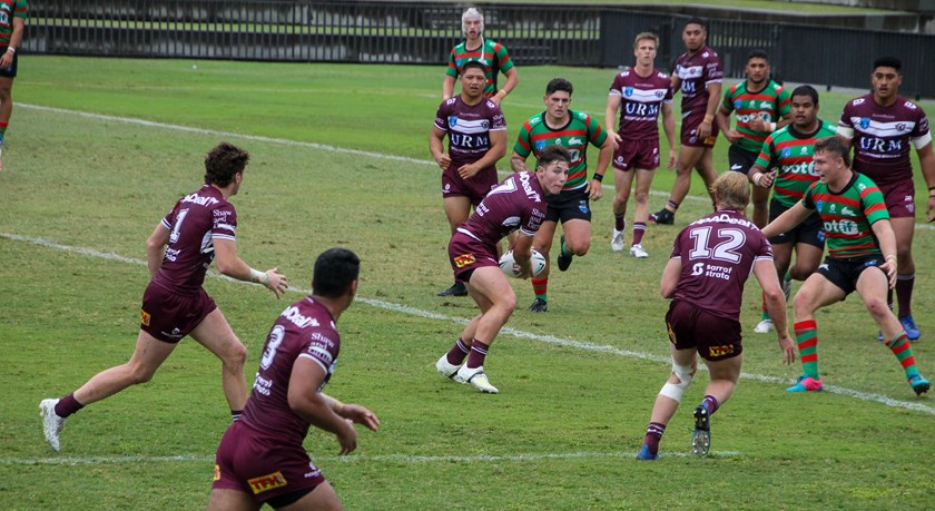 Manly half Jamie Humphreys looks for support against Souths. 