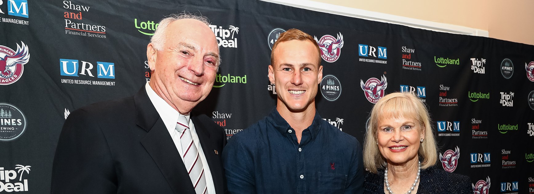 Daly Cherry-Evans received  the Roy Bull 'Best and Fairest' award from Sea Eagles Co-Owners Rick and Heather Penn