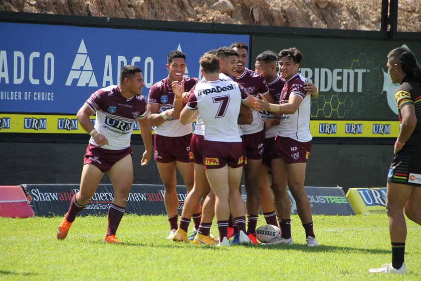 The Sea Eagles celebrate another try.