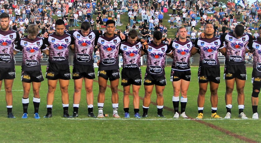 Blacktown Workers Sea Eagles line up for the ANZAC Remembrance Service.