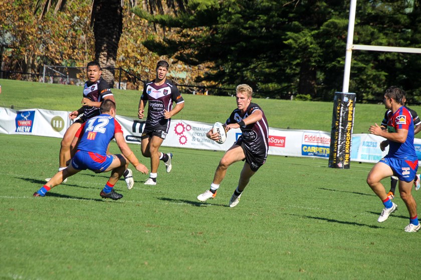 Ben Trbojevic takes on the Knights defence.