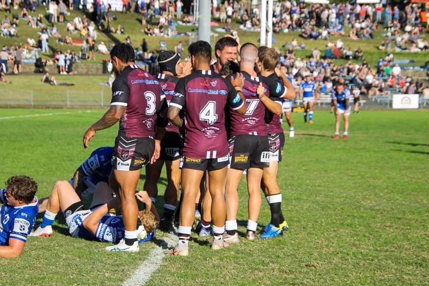 Blacktown Workers celebrate the try to Luke Hodge