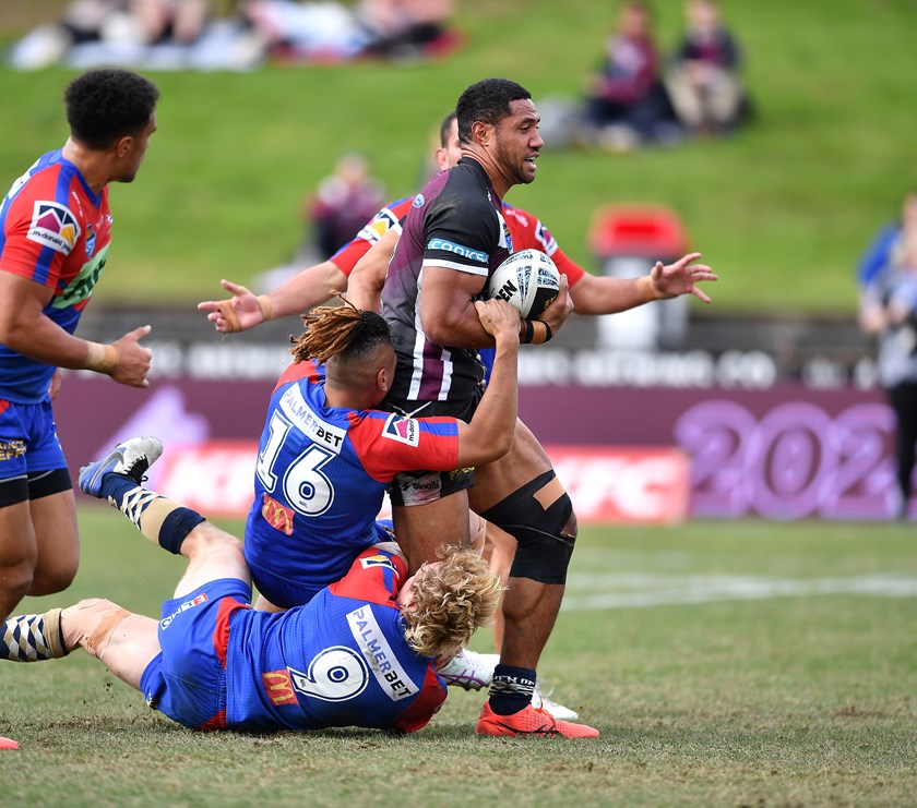 Prop Taniela Paseka tries to break free of the Knights defence.