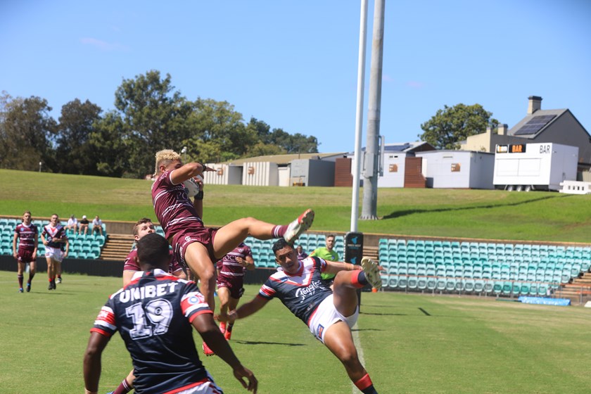 Winger Cameron Brown flies high against the Roosters last Sunday