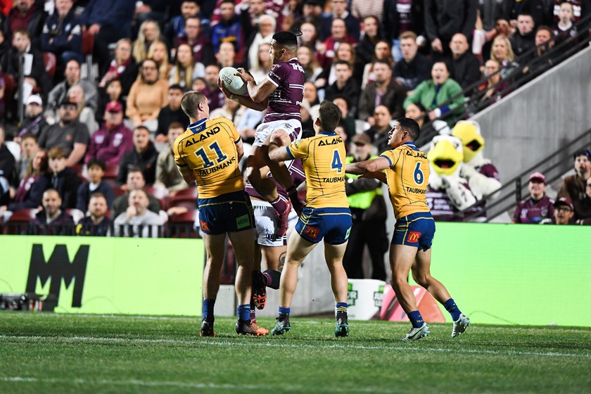 Air time...Tolu Koula flies high for his try