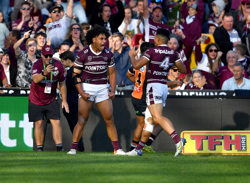 Try time...Christian Tuipulotu celebrates against the Wests Tigers at 4 Pines Park.