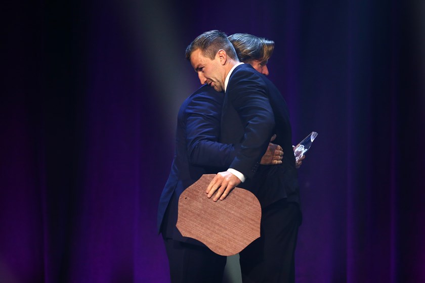 Proud moment...Lachlan Croker receives his Best and Fairest award from Coach Des Hasler.