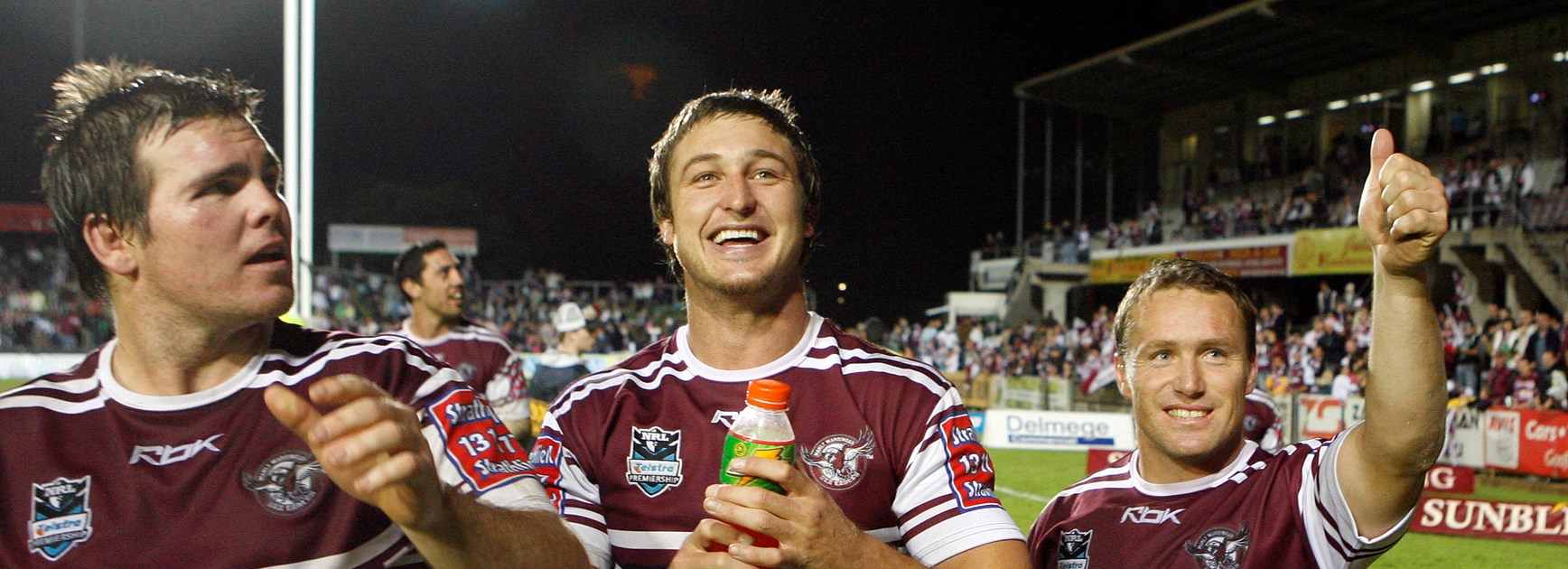 Memories...Jamie Lyon, Chris Hicks, and Matt Orford enjoy a victory lap after their win over the Storm in 2007.