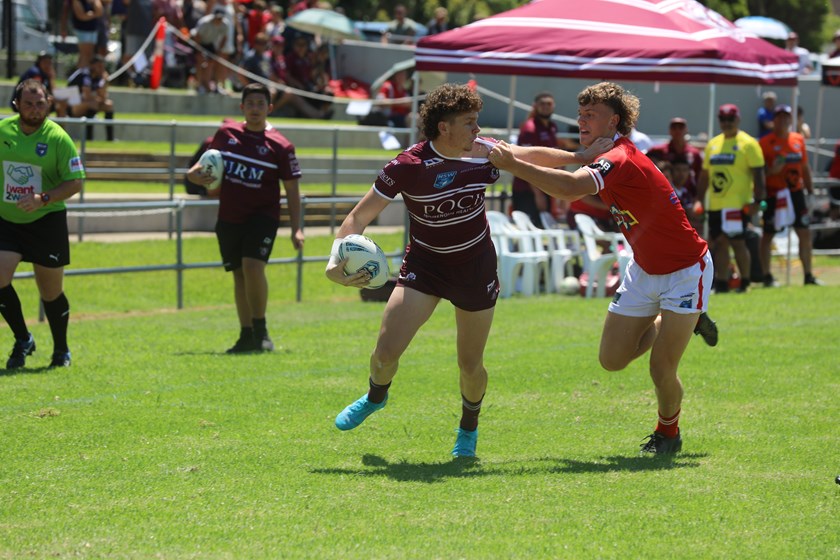 Tussle..Luke Tucker tries to shake off his opponent