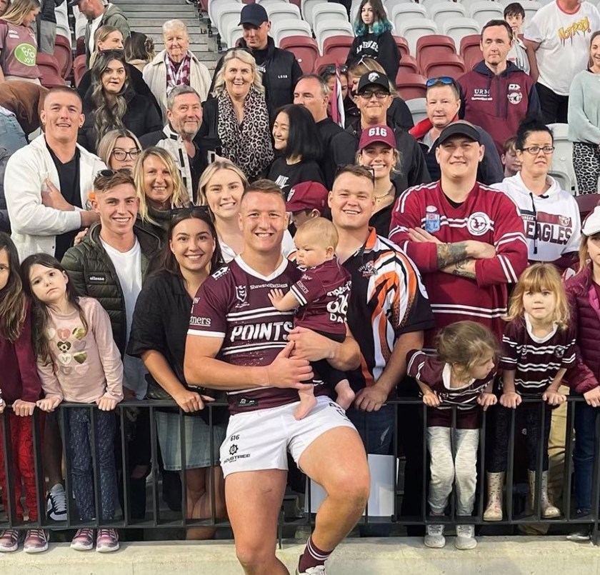 Proud moment...Sean Keppie celebrates his 50th NRL game with his family at 4 Pines Park.