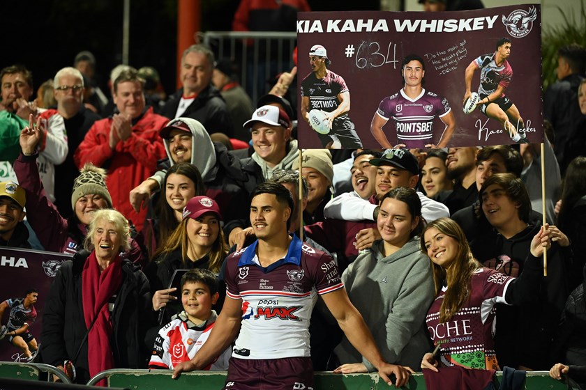 Special moment...Kaeo Weekes celebrates his NRL debut with family and friends following the round 19 match against the Dragons at Kogarah.