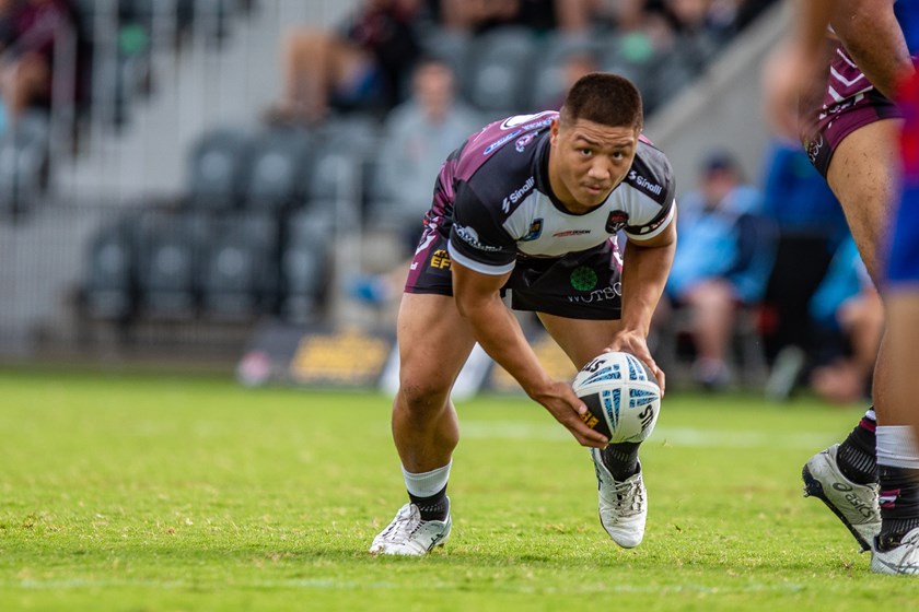 Taking off....Hooker Gordon Chan Kum Tong looks to dart out of dummy half.