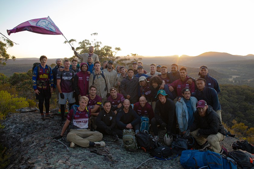 Flying the flag...Sea Eagles players on top of Elephant Mountain
