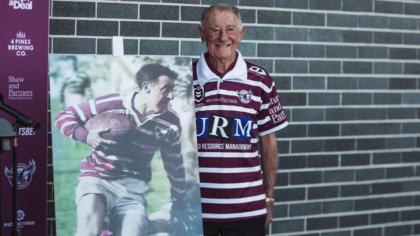 Where it all began...Ken Arthurson in his Heritage jersey with a portrait from his playing days at Manly in 1951.