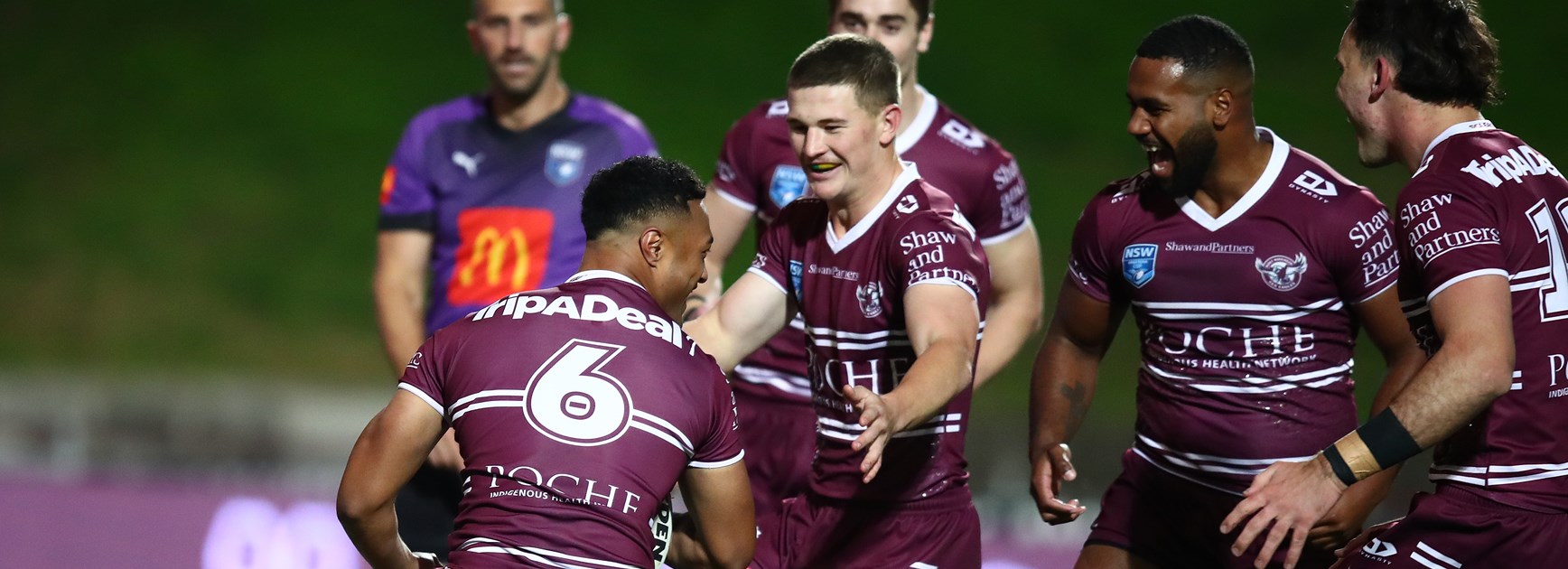 The Sea Eagles celebrate one of Latu Fainu's two tries