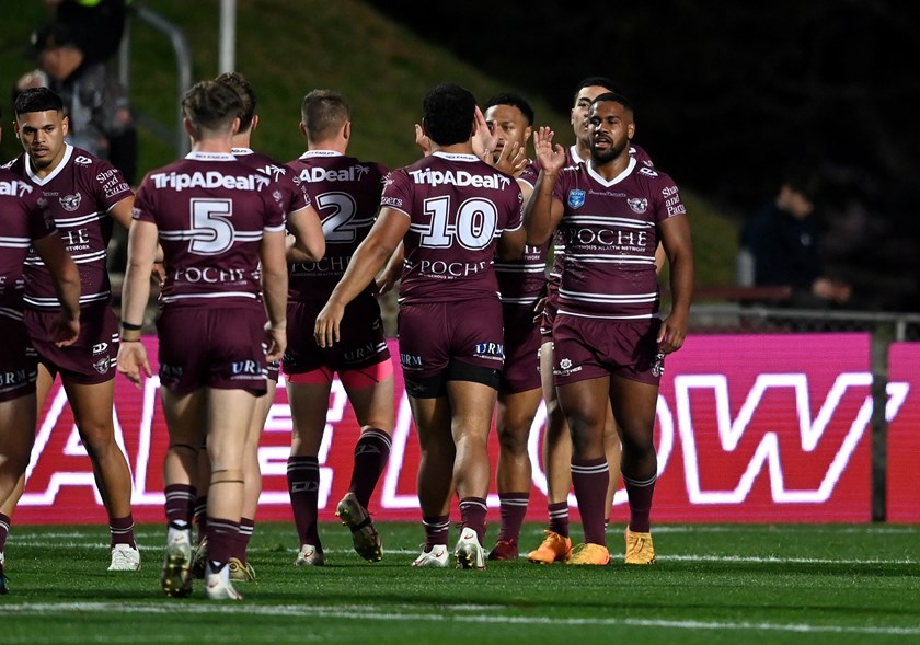 That winning feeling....Manly players celebrate one of their tries in the victory over Penrith
