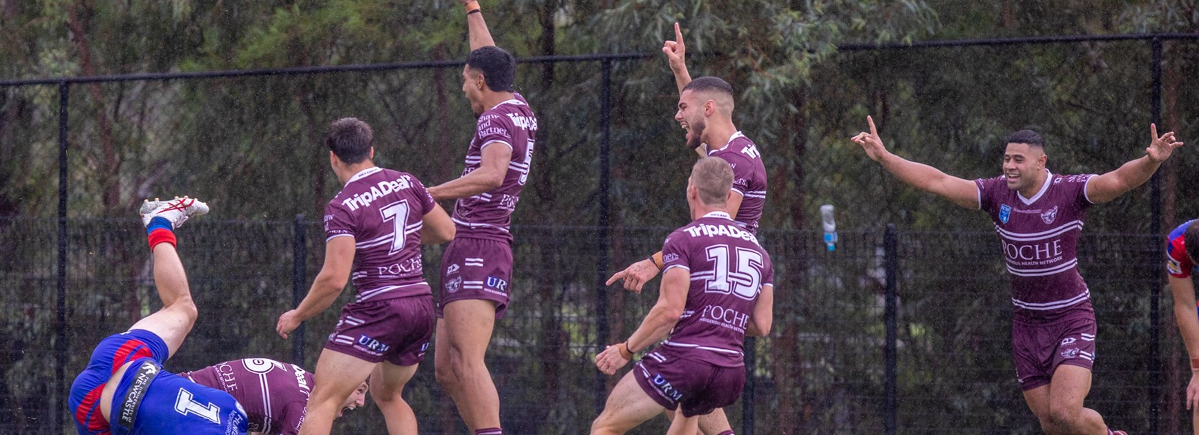 The Sea Eagles celebrate the try of Jamie Humphreys to take the lead.