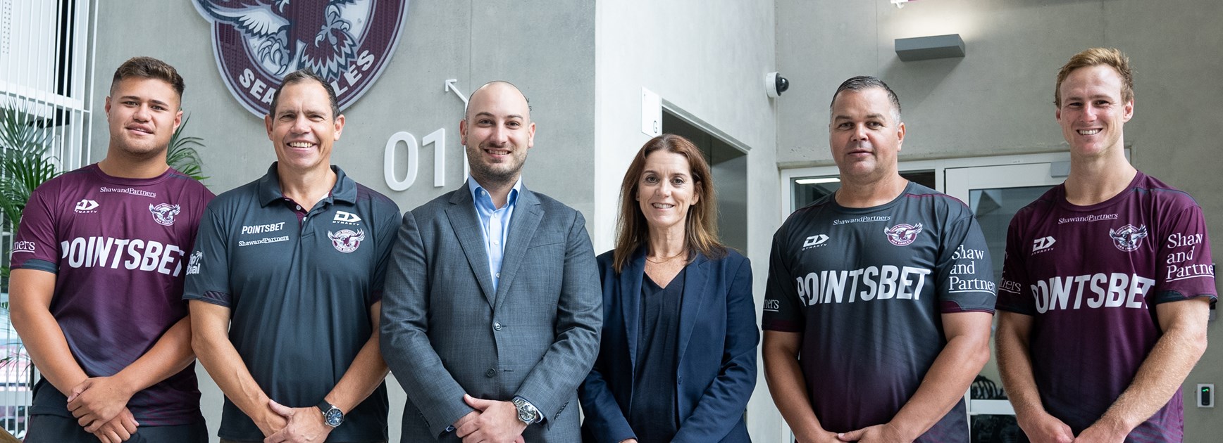 United...(l-r) Josh Schuster, Sea Eagles CEO Tony Mestrov, Manly Leagues Club CEO Julien Bova, Manly Leagues Club Chairwoman Julie Sibraa, Coach Anthony Seibold, and Captain Daly Cherry-Evans.