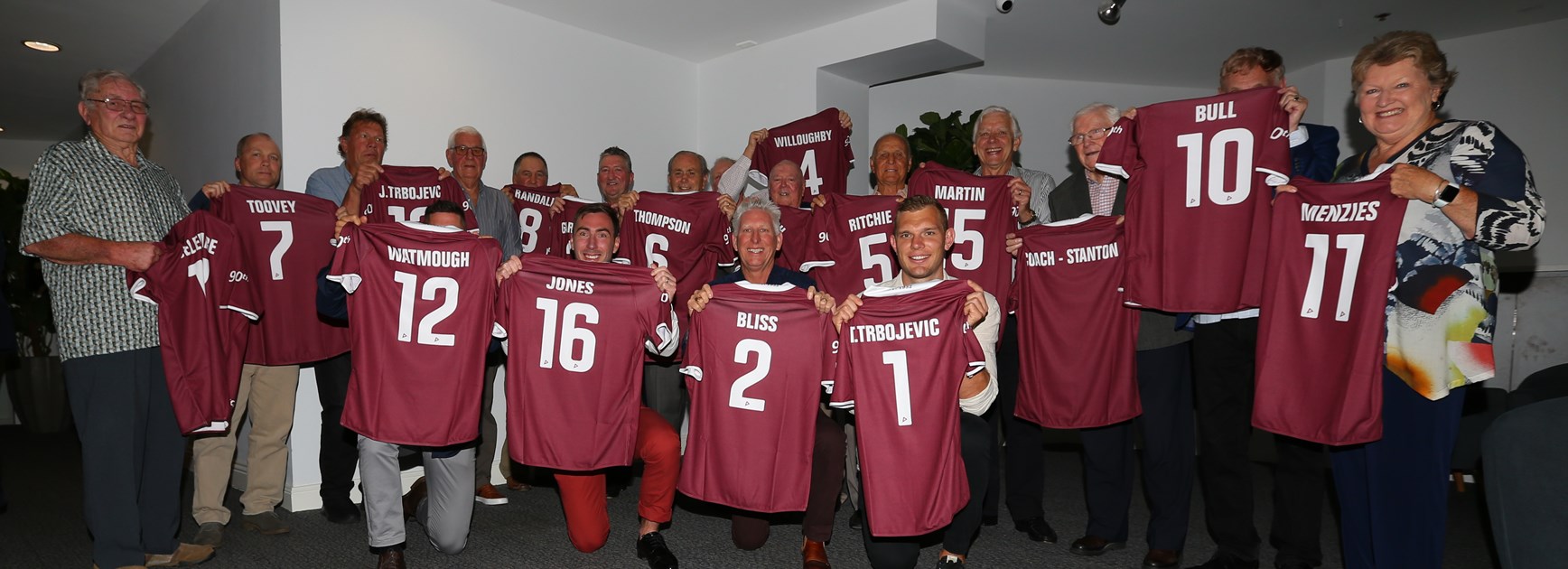 Legends...players and family representatives of the 90th Anniversary team with their commemorative jerseys.