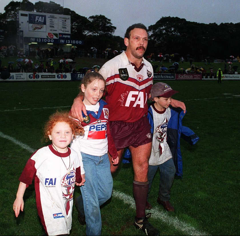 Cliff Lyons shares a special moment with his kids at Brookvale Oval in 1998 