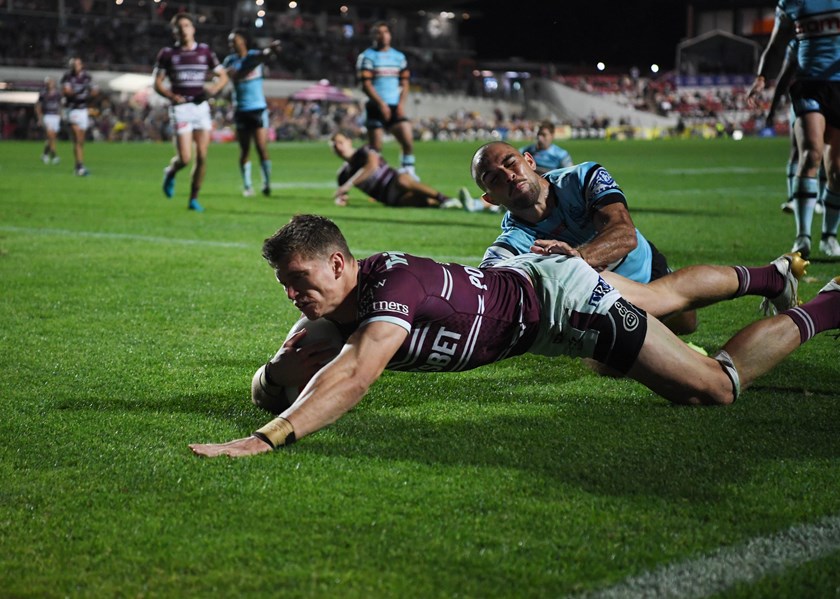 Try time...Reuben Garrick crosses in his 100th NRL game for Manly