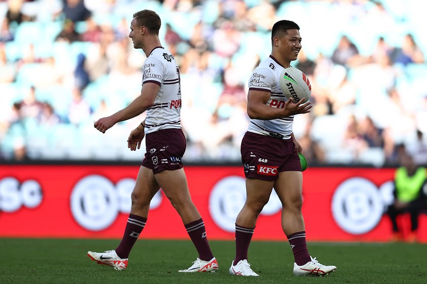 Over to you mate...Gordon Chan Kum gets the ball from Daly Cherry-Evans for his penalty attempt