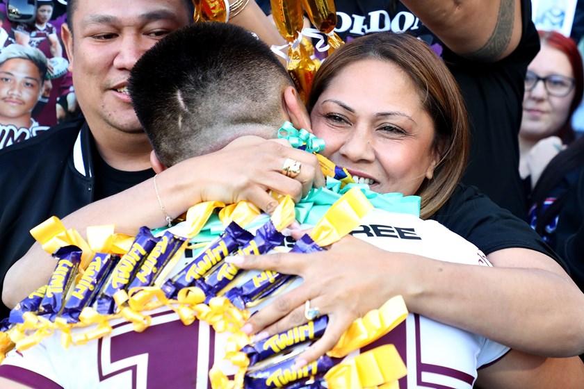 Precious moment....Proud Mum, Fay, hugs her son Gordon Chan Kum Tong