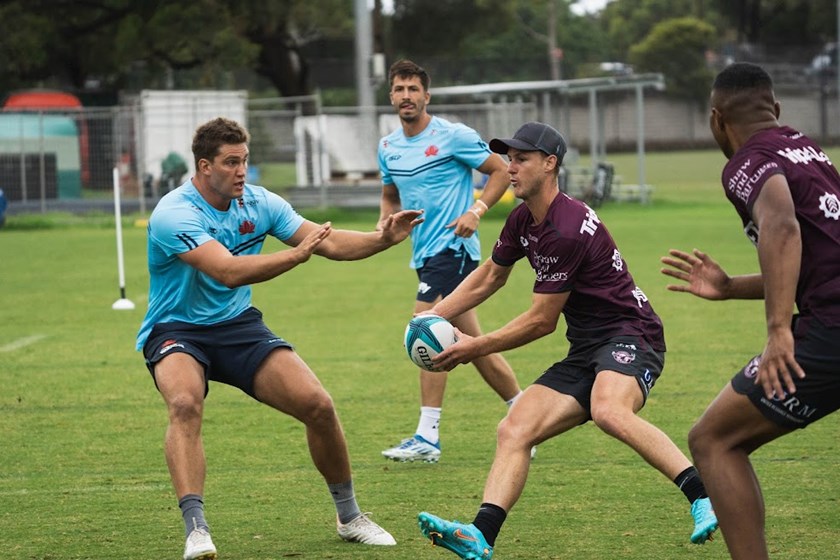 Manly half-back and captain Daly Cherry-Evans takes on the Waratahs defence