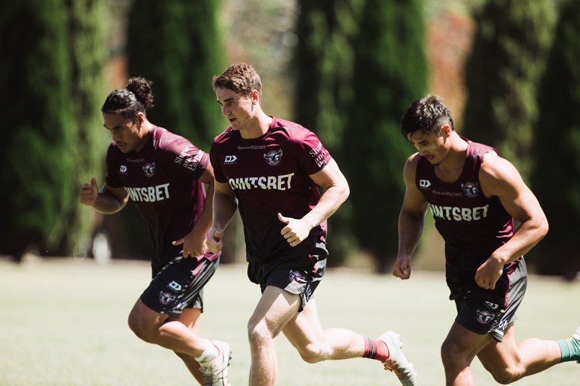 Training drills...Fletcher Myers (centre) pushes himself at training