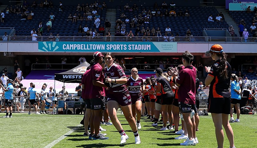 Honour...Ana-Sofima Seia Perez leads the first ever Manly Warringah Sea Eagles girls team out in the Tarsha Gale Cup