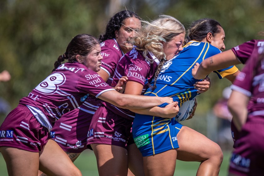 Bird gang....the Sea Eagles girls muscle up in defence