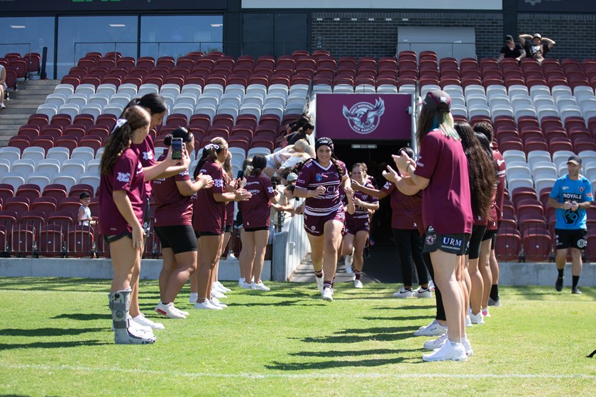Captain Ana-Sofima Seia Perez leads the Manly team onto to the field for their first ever premiership match at Brookvale Oval