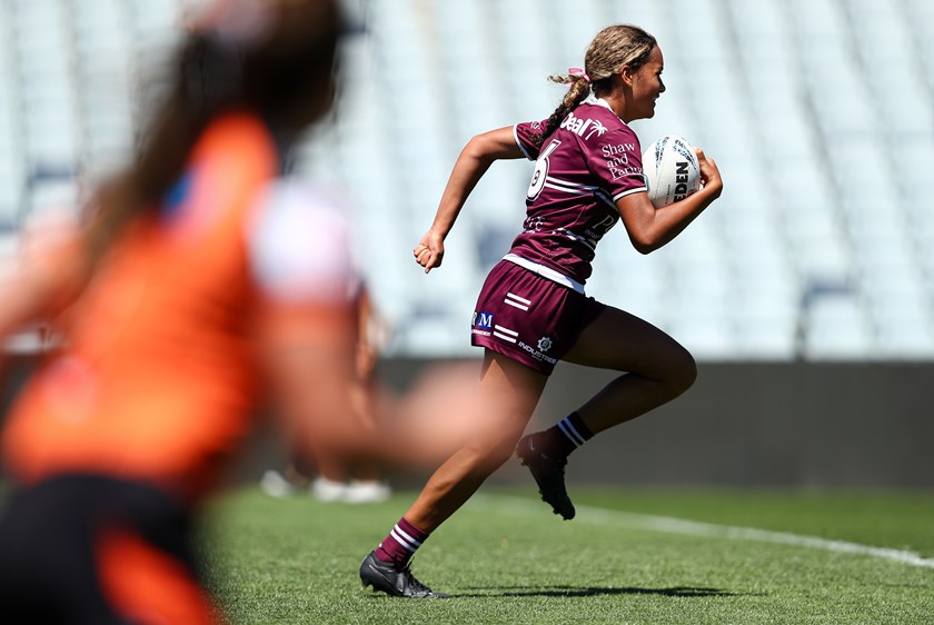 Go!!!....Aaliyah Haumono sets sails for the line to score the winning try for the Sea Eagles