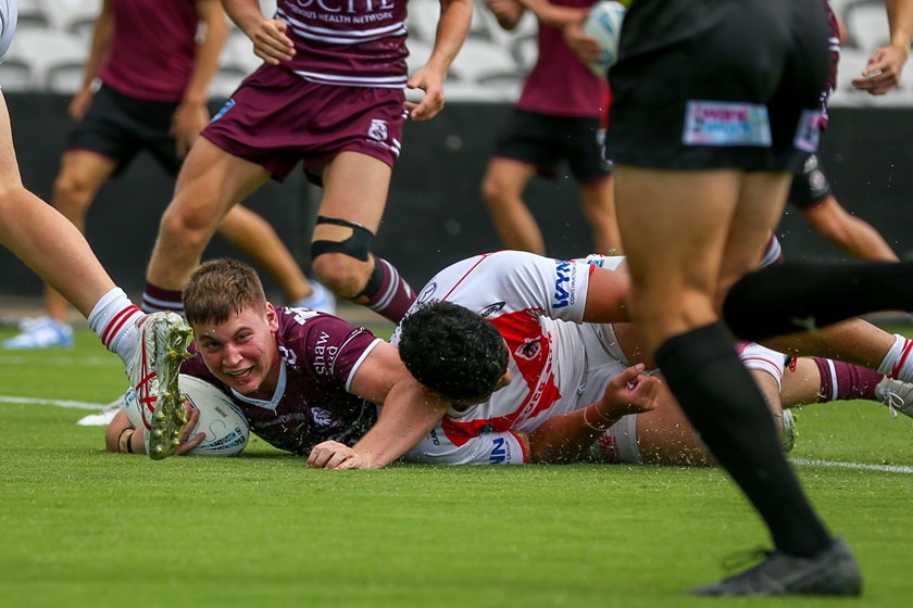 All smiles...Kaleb Serafin crashes over for his try
