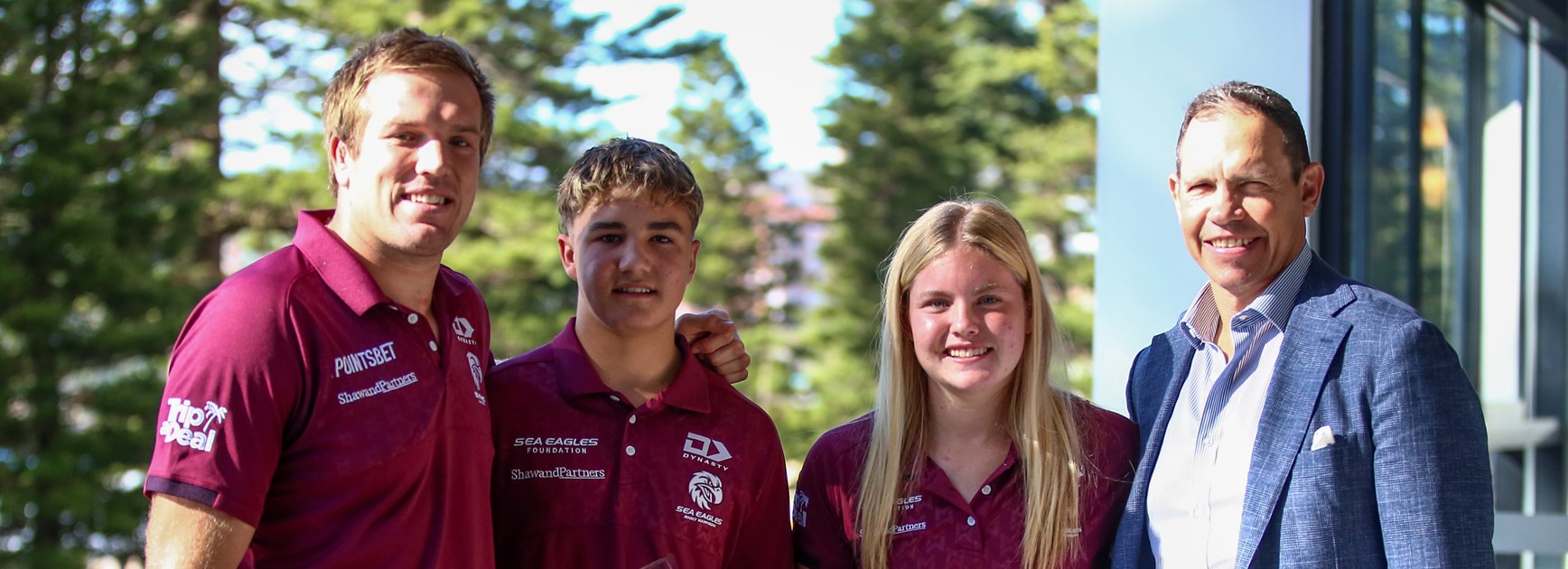 Proud moment....Cruz Death and Lili Boyle with Manly NRL star Jake Trbojevic and Sea Eagles CEO Tony Mestrov with their awards