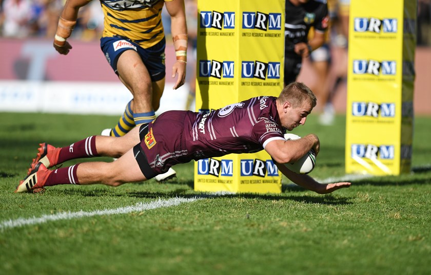 Special moment...Lachlan Croker dives over for his first try for the Sea Eagles