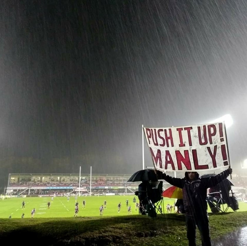 A case of Rain, Hail or Shine for Jake and his beloved Push It Up Manly sign