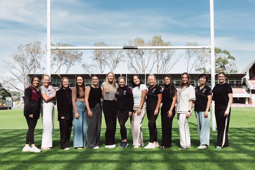 Ladies line up: Sea Eagles staff at 4 Pines Park in Women in League Round 